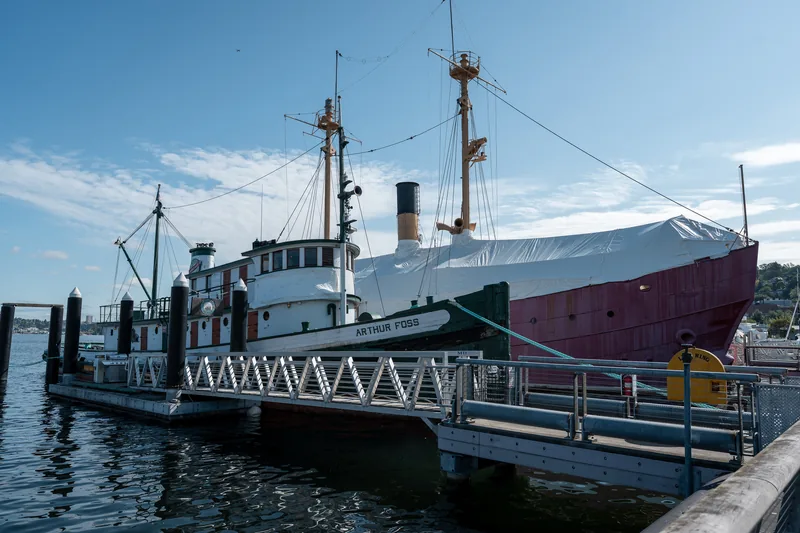 A sailing ship viewed from its dockside gangway.