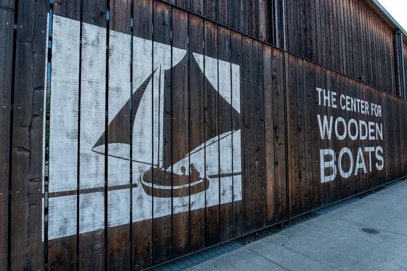 The Center for Wooden Boats sign on a timber wall.