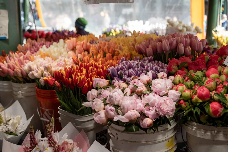 Colorful bouquets displayed at a flower market.